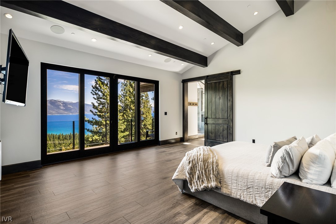 567 Alden Lane Incline Village, NV 89451 - Photo 12 of 35 a bedroom with a bed and wooden floor