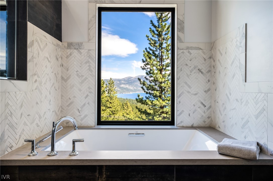 567 Alden Lane Incline Village, NV 89451 - Photo 13 of 35 a bathroom with a bathtub and a sink
