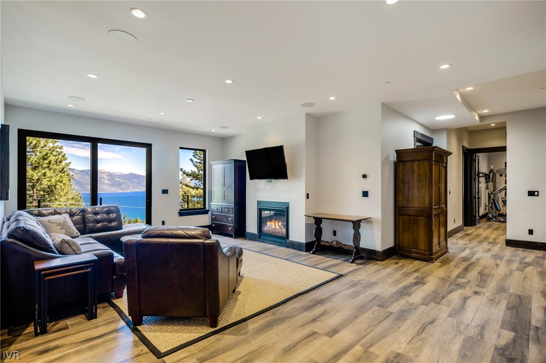 567 Alden Lane Incline Village, NV 89451 - Photo 16 of 35 a living room with furniture and a flat screen tv