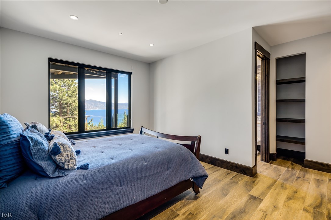 567 Alden Lane Incline Village, NV 89451 - Photo 17 of 35 a bedroom with a bed and a window