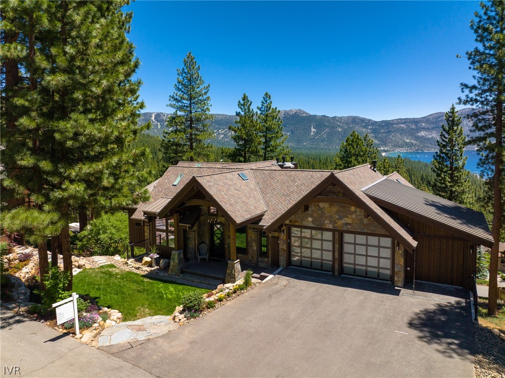 567 Alden Lane Incline Village, NV 89451 - Photo 2 of 35 a view of house with a yard and potted plants