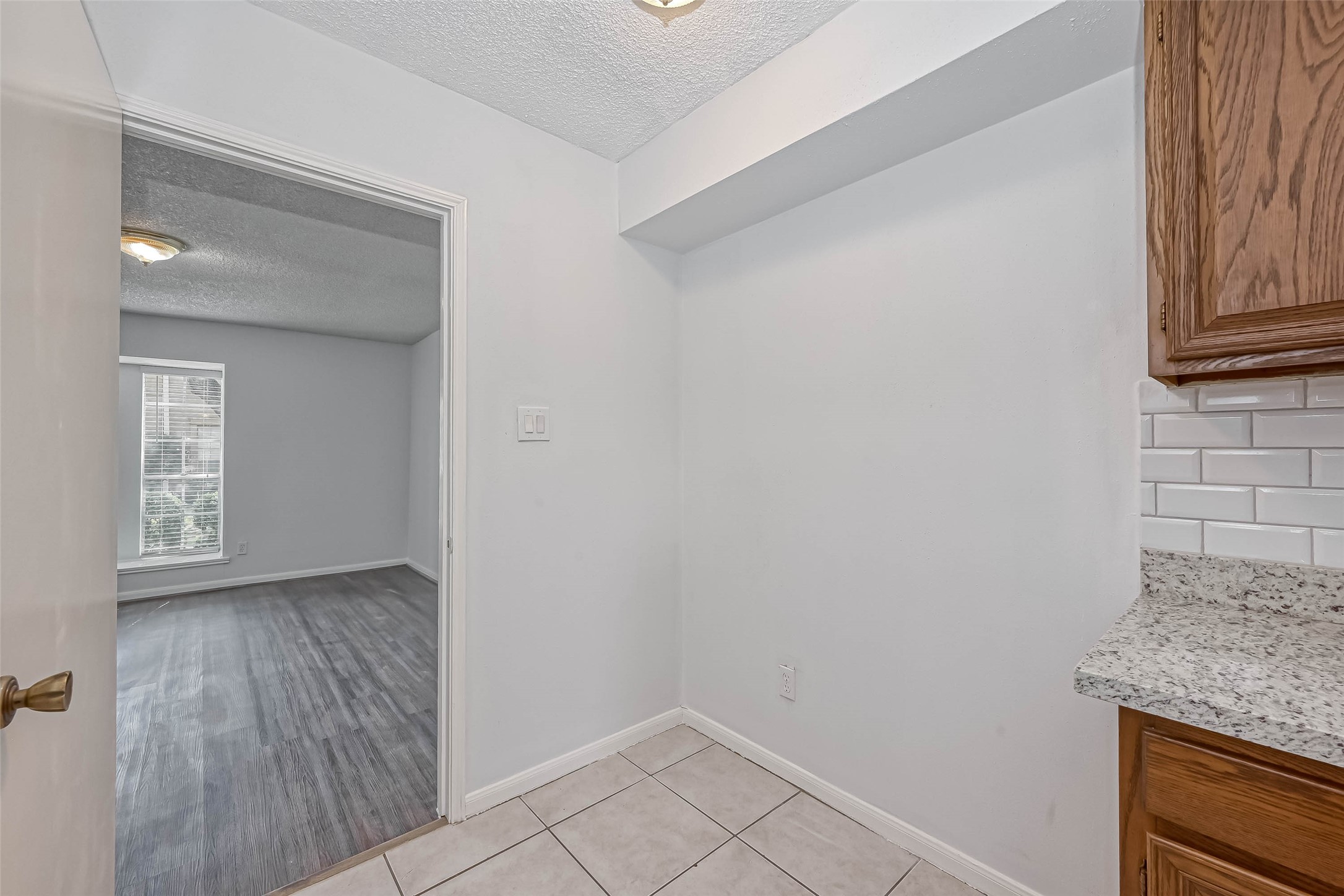 14179 Misty Meadow Lane Houston, TX 77079 - Photo 21 of 41 a view of an empty room and wooden floor
