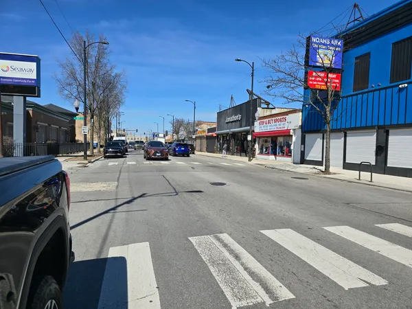 a street view of building with traffic signal lights