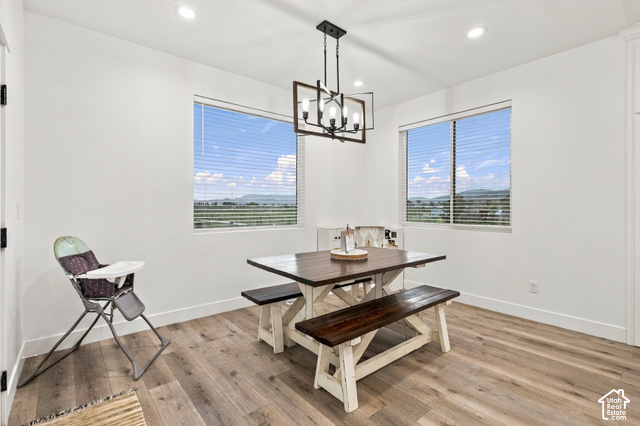 244 East Sevier River Road Central Valley, UT 84754 - Photo 29 of 66 Wood-finish flooring with white baseboards, recessed lighting, and a modern geometric chandelier
