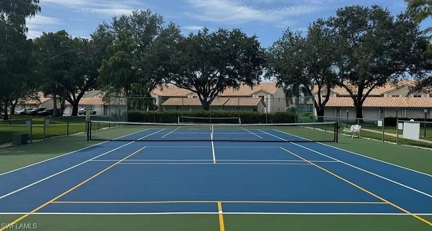 5908 Cranbrook Way, Unit I202 Naples, FL 34112 - Photo 44 of 45 a view of tennis court
