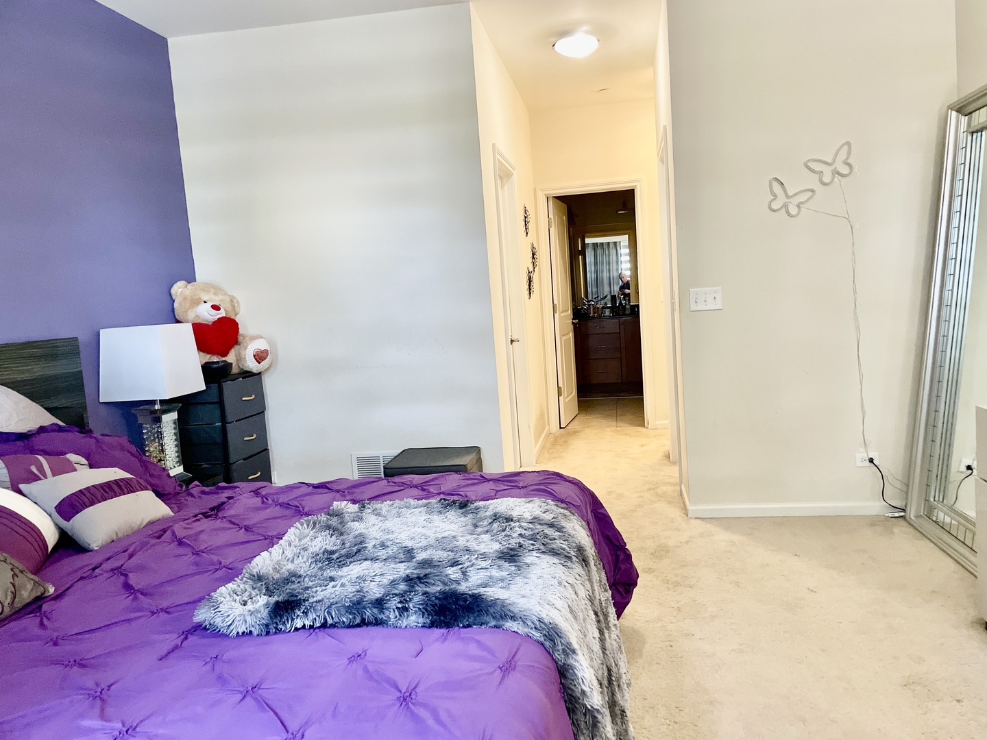 2018 Shermer Road, Unit 2018 Glenview, IL 60026 - Photo 17 of 39 a bedroom with a bed and a lamp