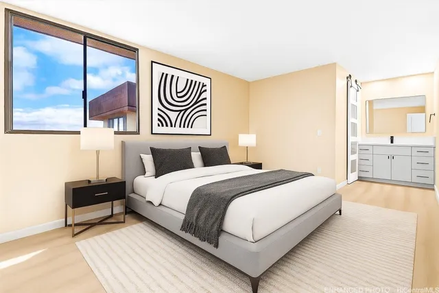 a view of an empty room with a window and a mirror