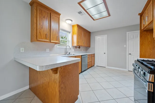 a bathroom with a sink vanity and a mirror