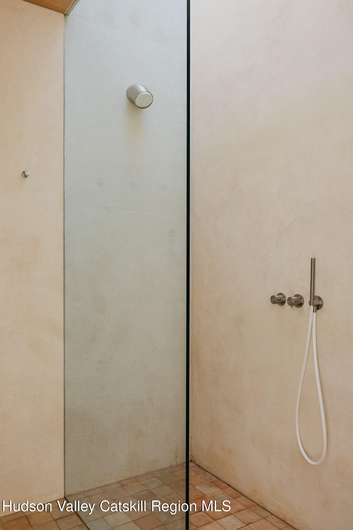 261 Blackhead Mountain Road Round Top, NY 12473 - Photo 24 of 40 a bathroom with a glass shower door
