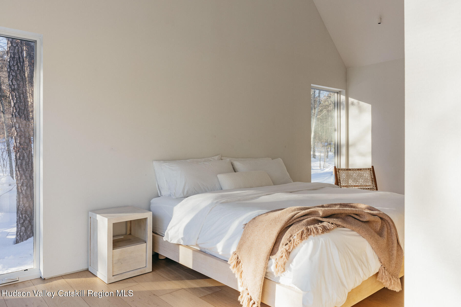261 Blackhead Mountain Road Round Top, NY 12473 - Photo 27 of 40 a bedroom with a bed and a window