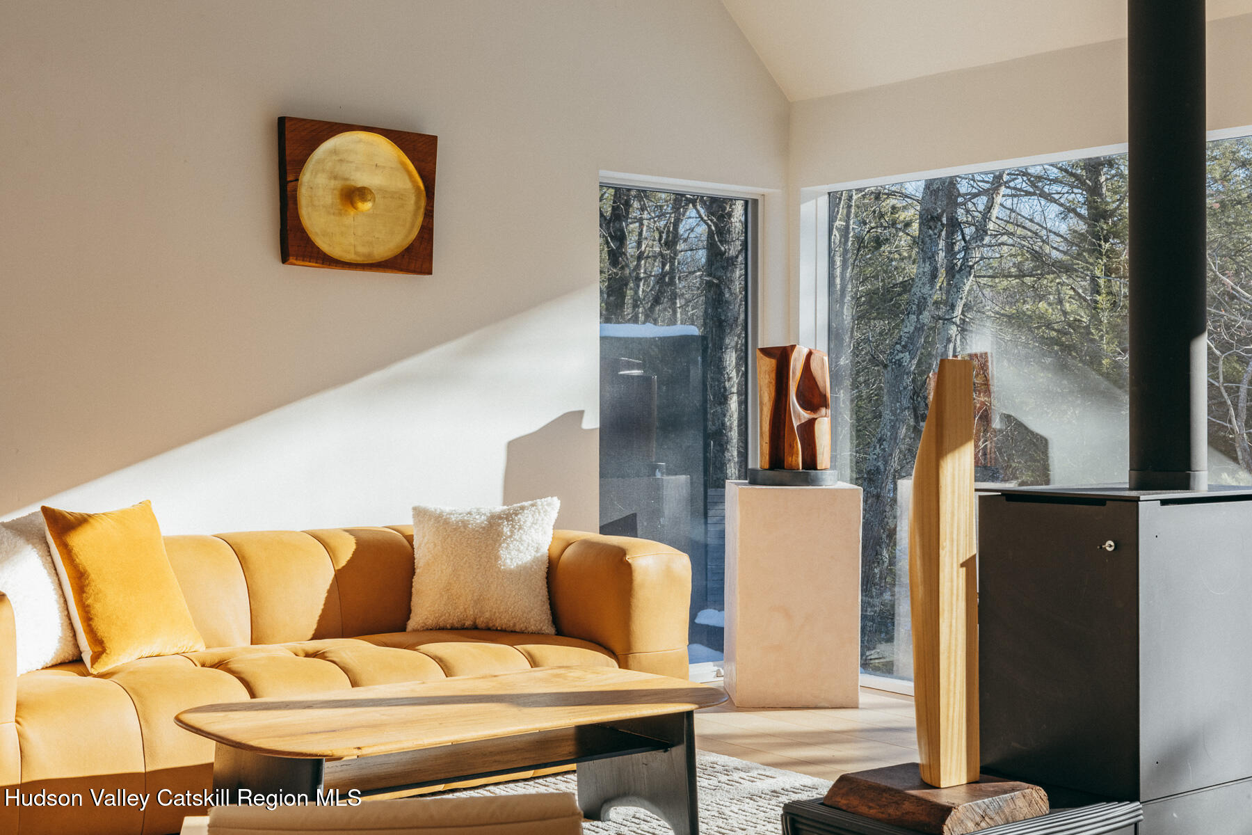 261 Blackhead Mountain Road Round Top, NY 12473 - Photo 8 of 40 a living room with furniture and a window
