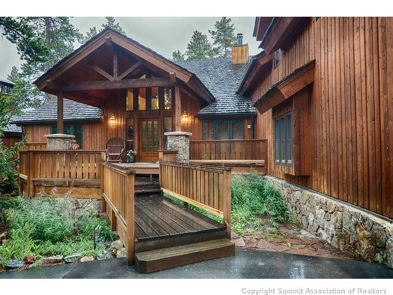 1005 4 O Clock Road Breckenridge, CO 80424 - Photo 2 of 24 a view of a chairs and table in the backyard