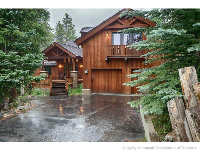 1005 4 O Clock Road Breckenridge, CO 80424 - Photo 3 of 24 a view of a house with a small yard and floor to ceiling window
