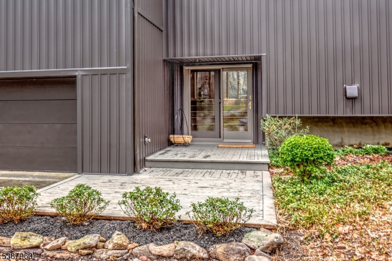 12 Big Spring Road Califon, NJ 07830 - Photo 11 of 33 a front view of a house with a garden