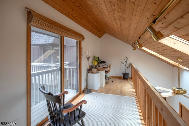 12 Big Spring Road Califon, NJ 07830 - Photo 14 of 33 a view of a patio with a table and chairs