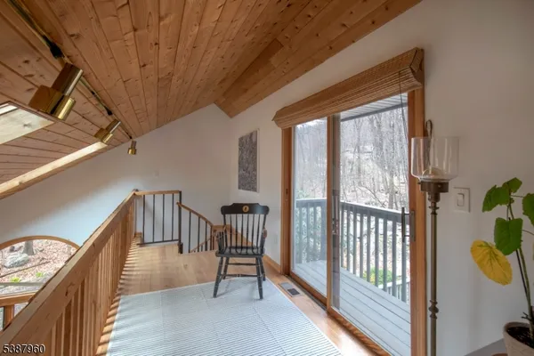 a view of entryway with wooden floor