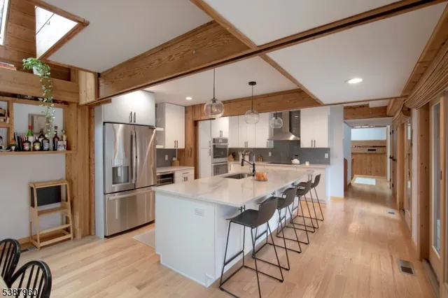 a kitchen with counter top space and refrigerator