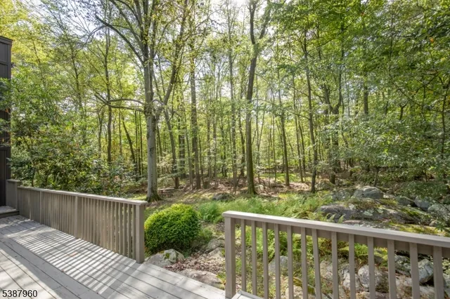 a view of a balcony with an outdoor space
