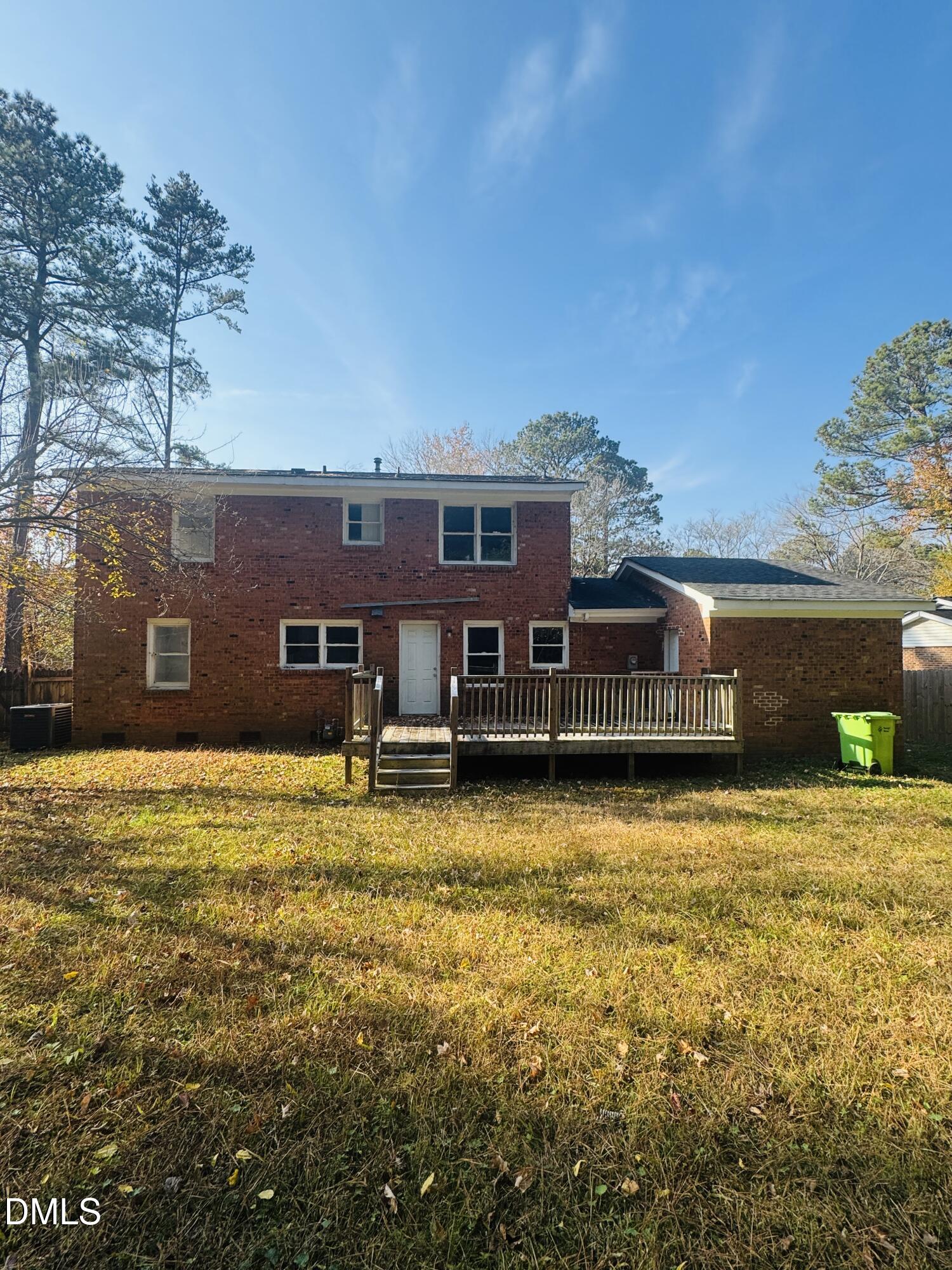 2513 Foxgate Drive Raleigh, NC 27610 - Photo 3 of 7 a front view of a house with a yard
