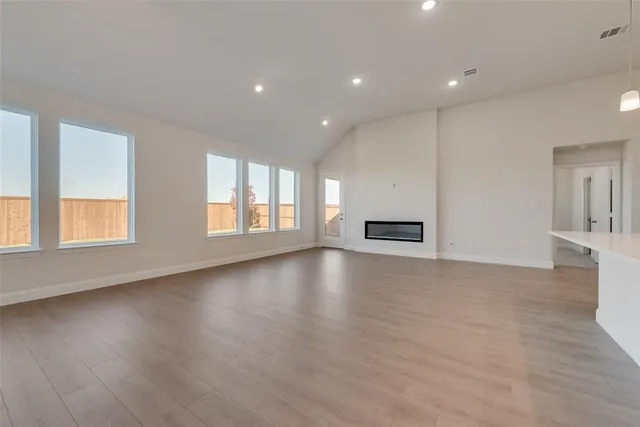 a view of livingroom and hardwood floor