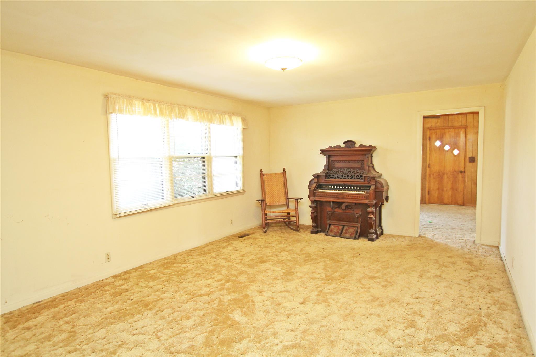 3912 Robert Pryor Road Springfield, TN 37172 - Photo 11 of 28 a view of a bedroom with furniture and natural light