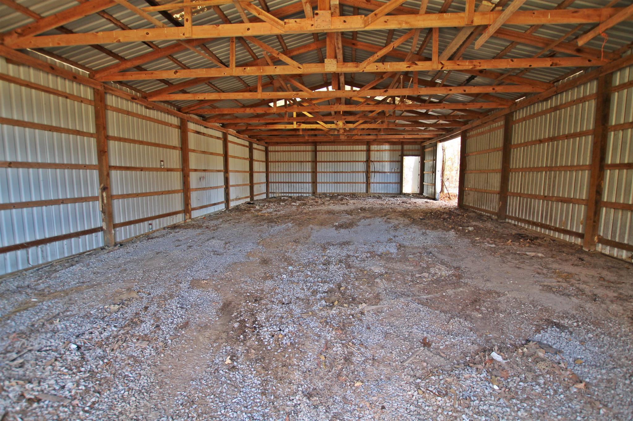 3912 Robert Pryor Road Springfield, TN 37172 - Photo 19 of 28 a view of a room with wooden walls