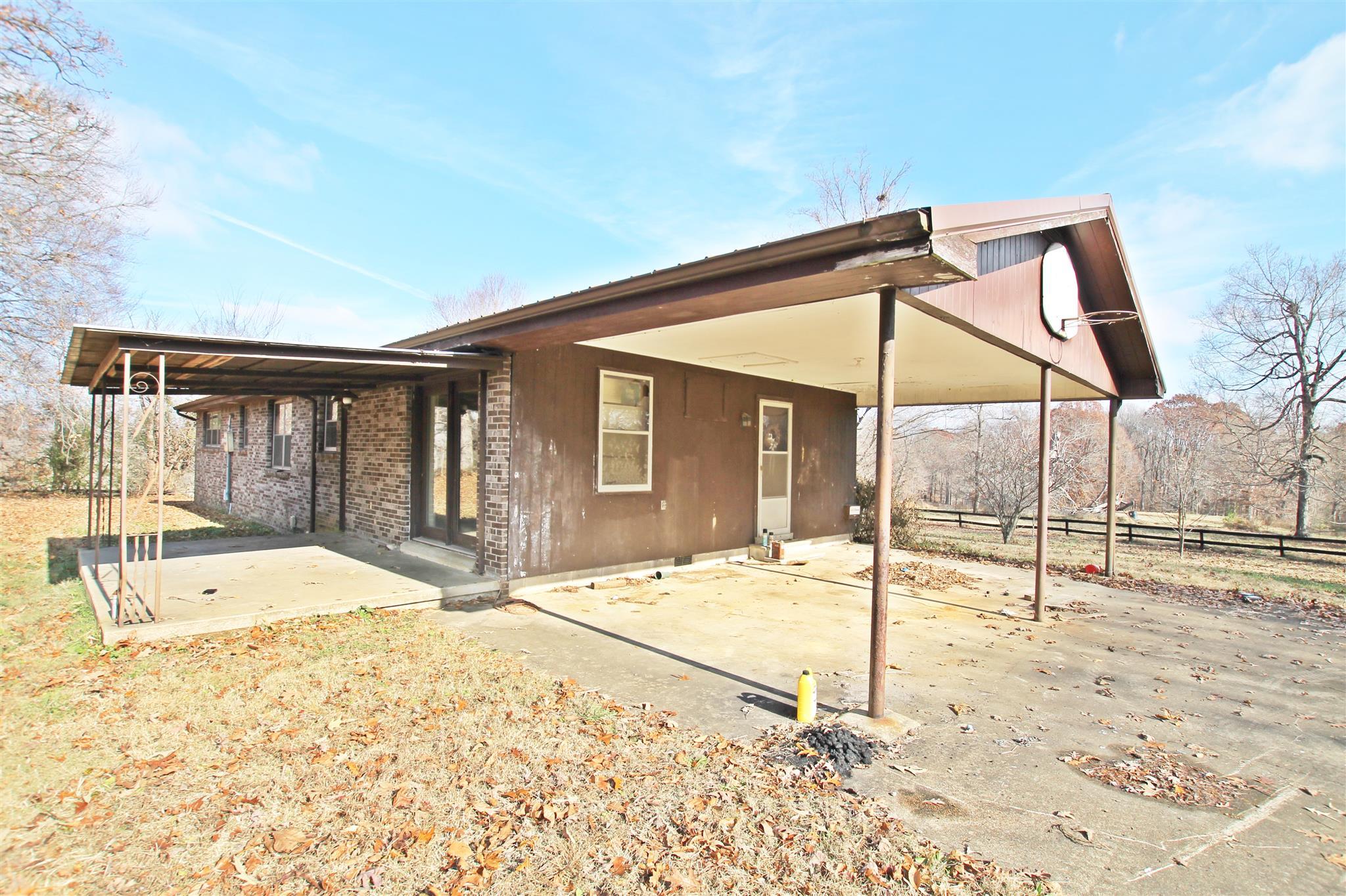 3912 Robert Pryor Road Springfield, TN 37172 - Photo 3 of 28 a view of a house with a backyard and windows