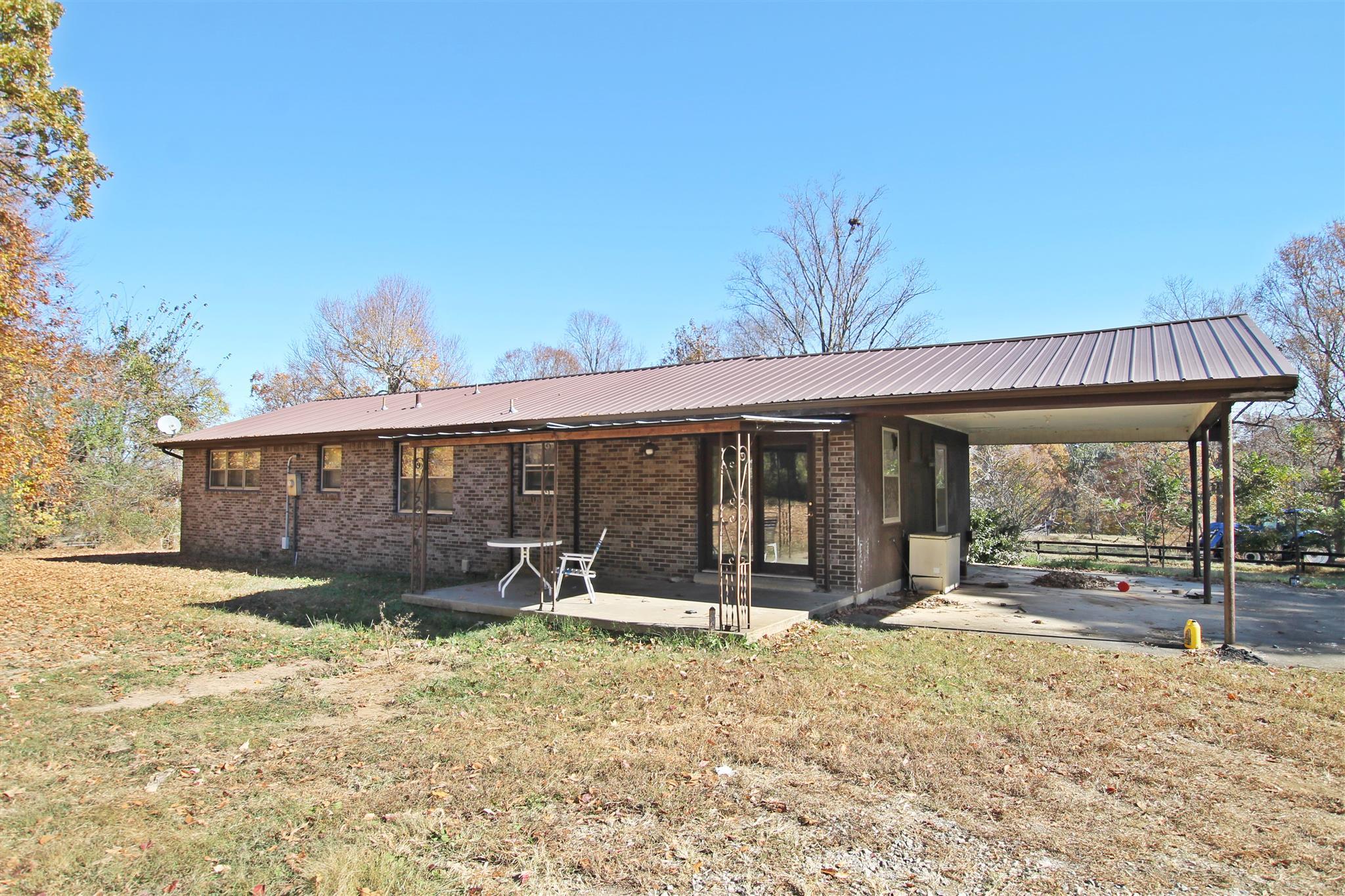 3912 Robert Pryor Road Springfield, TN 37172 - Photo 5 of 28 a front view of a house with a yard outdoor seating and kitchen