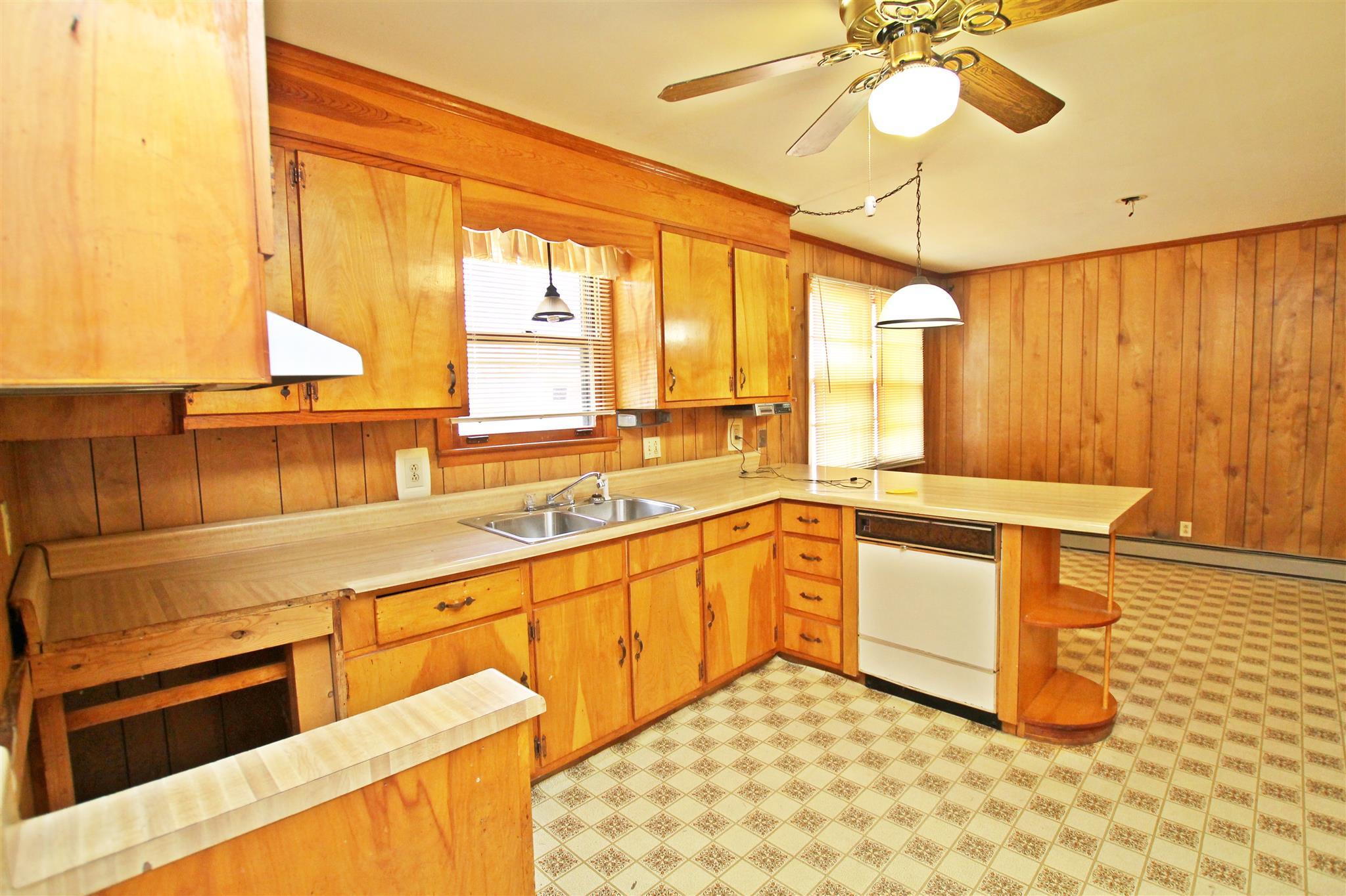 3912 Robert Pryor Road Springfield, TN 37172 - Photo 7 of 28 a large white kitchen with a large window