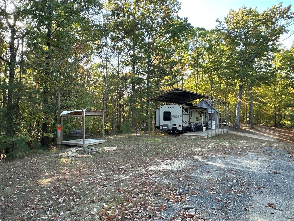 1806 Browning Road Rockmart, GA 30153 - Photo 47 of 89 a view of a house with a yard and sitting area