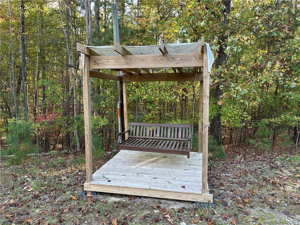 1806 Browning Road Rockmart, GA 30153 - Photo 49 of 89 a view of a wooden deck with a small yard