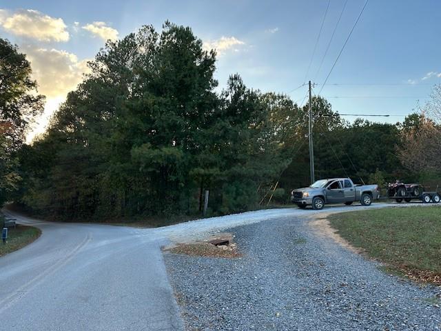 1806 Browning Road Rockmart, GA 30153 - Photo 87 of 89 a backyard of a house with lots of green space and plants