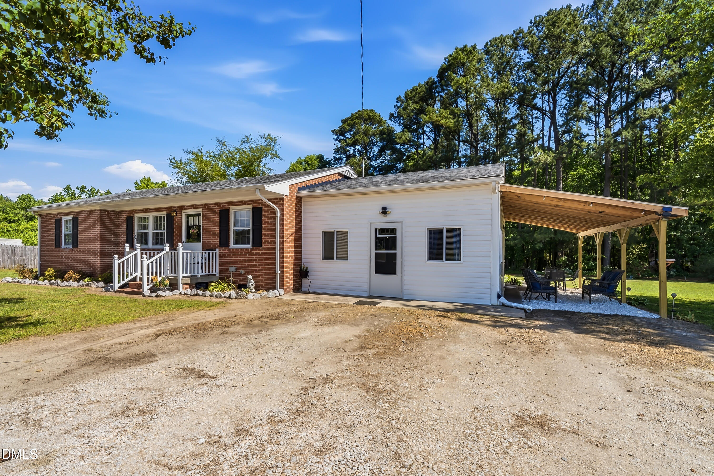 4967 Highway 581 Spring Hope, NC 27882 - Photo 4 of 44 a view of a house with backyard and porch