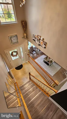 a bedroom with bed and window