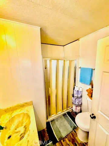 a view of a car park side of a road