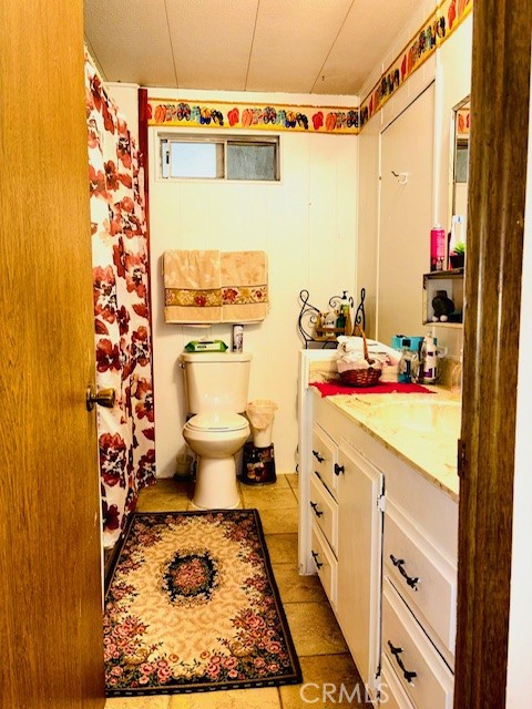 16601 Garfield Avenue, Unit 110 Paramount, CA 90723 - Photo 17 of 22 a bathroom with a sink and a toilet