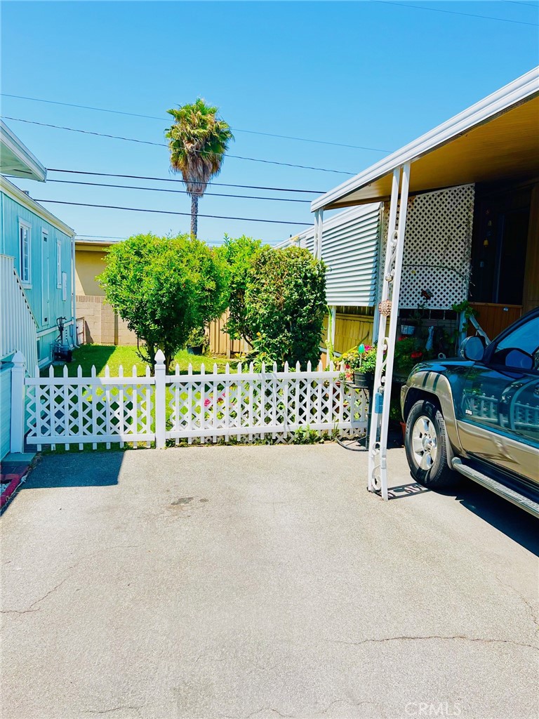 16601 Garfield Avenue, Unit 110 Paramount, CA 90723 - Photo 18 of 22 a view of a car park side of a road