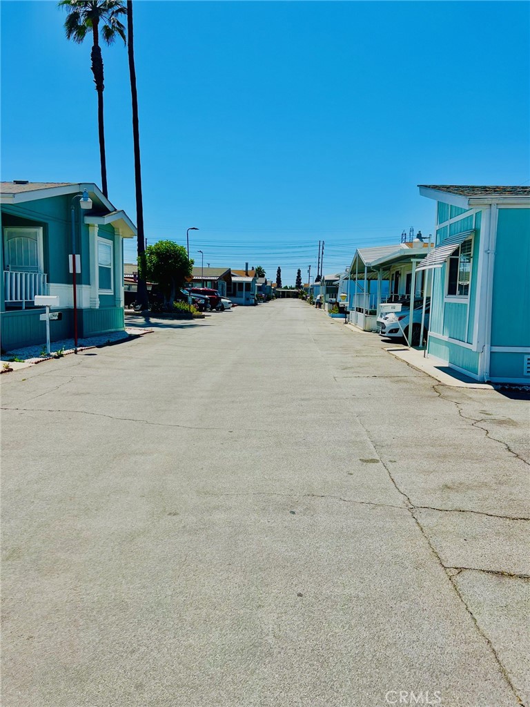 16601 Garfield Avenue, Unit 110 Paramount, CA 90723 - Photo 22 of 22 a view of a street with houses