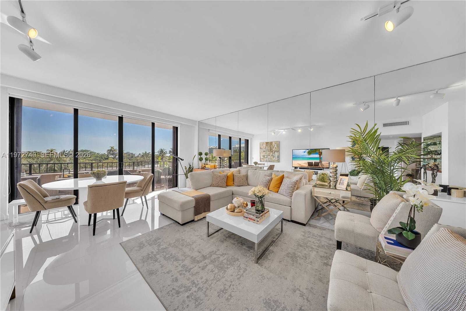 Key Colony Condominiums Key Biscayne, FL 33149 - Photo 4 of 20 a living room with furniture and a large window