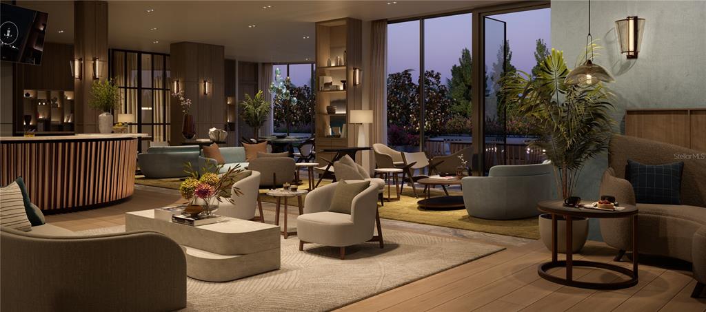 Undisclosed Address Sarasota, FL 34236 - Photo 18 of 24 a living room with couches a coffee table and a large mirror with potted plants