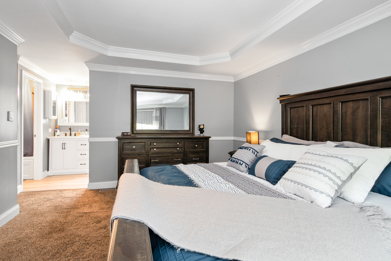13 Oakview Road Matteson, IL 60443 - Photo 15 of 23 a bedroom with a large bed and a dresser