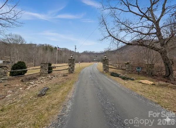 a view of a road with a yard