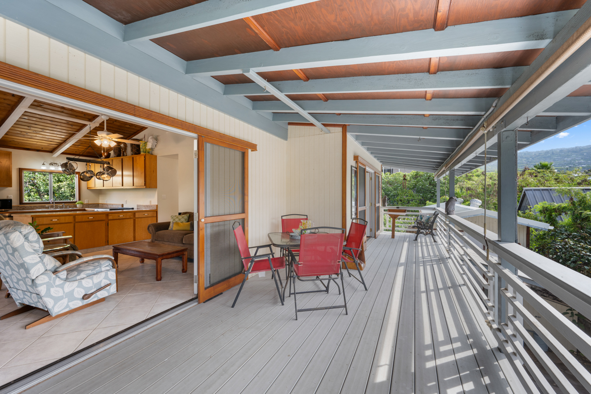 76-6179 Mania Road Kailua-Kona, HI 96740 - Photo 13 of 30 a balcony with chairs and wooden floor
