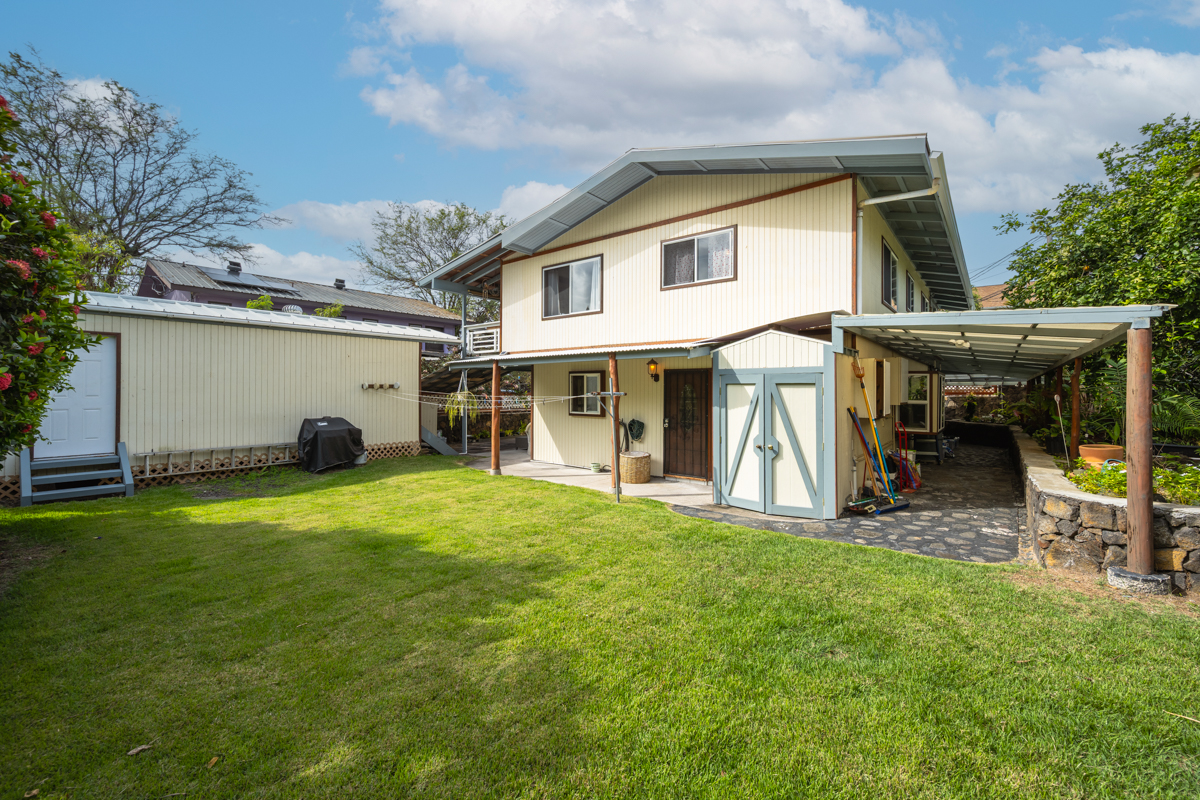 76-6179 Mania Road Kailua-Kona, HI 96740 - Photo 28 of 30 a view of a house with a yard and sitting area