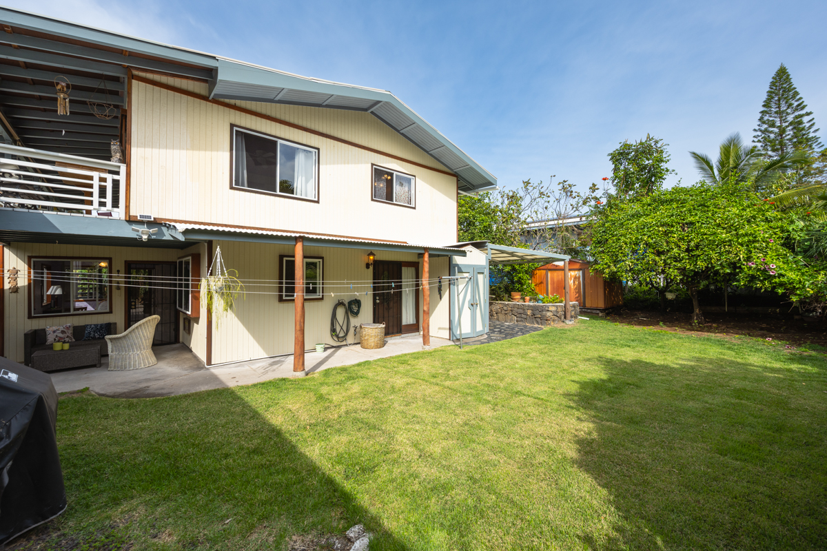 76-6179 Mania Road Kailua-Kona, HI 96740 - Photo 29 of 30 a view of a house with backyard and sitting area