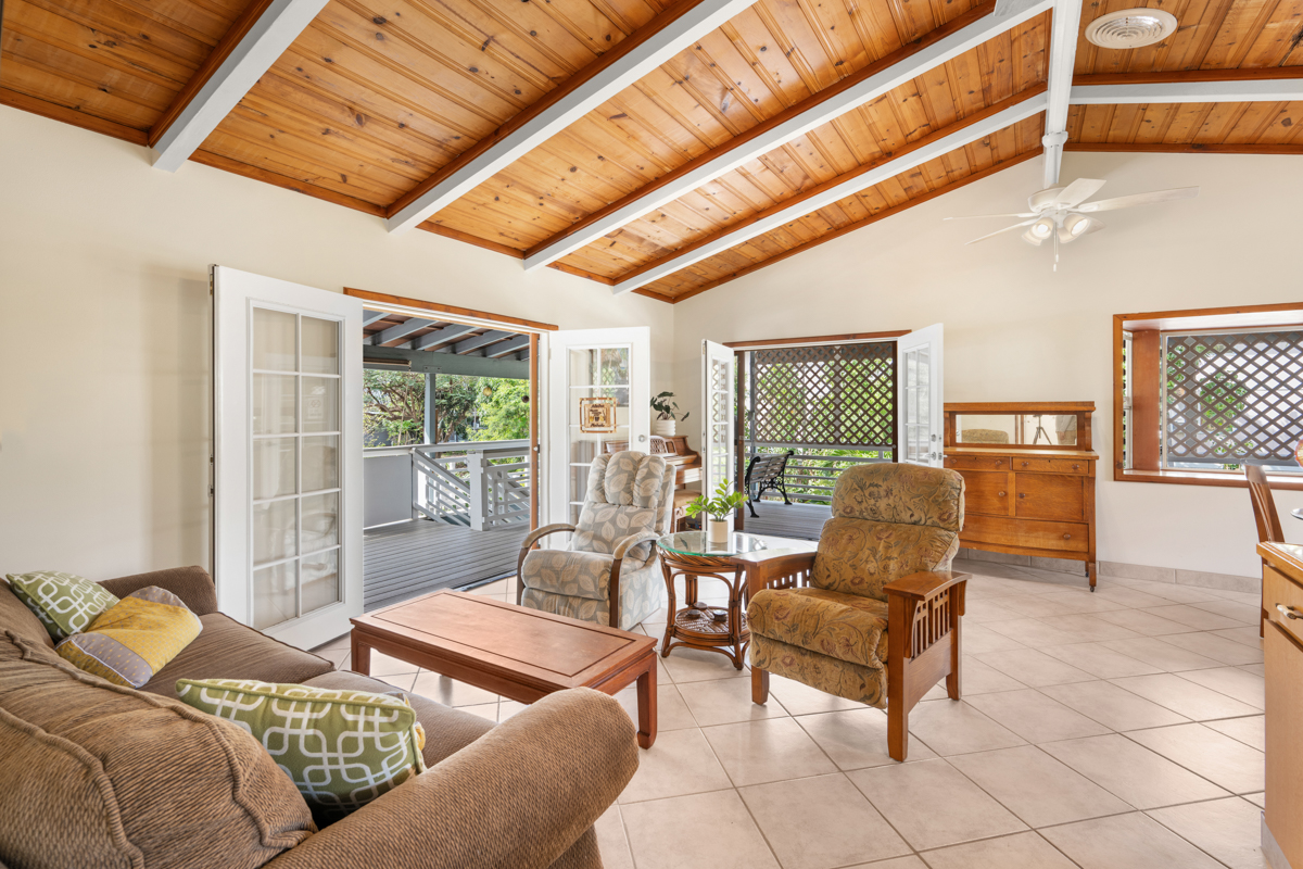 76-6179 Mania Road Kailua-Kona, HI 96740 - Photo 4 of 30 a living room with furniture and a floor to ceiling window