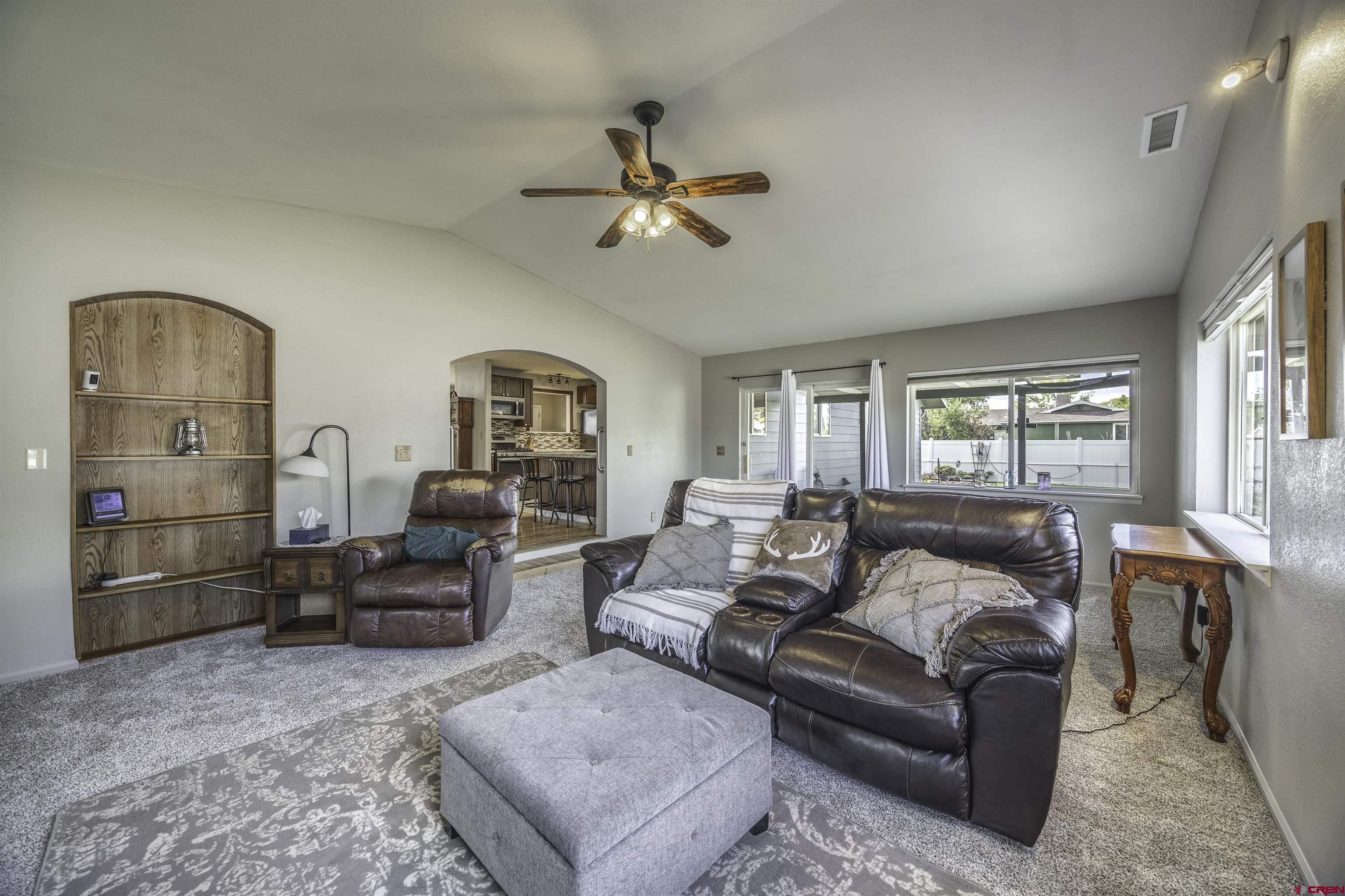 16303 6420th Road Montrose, CO 81403 - Photo 12 of 31 a living room with furniture and a window