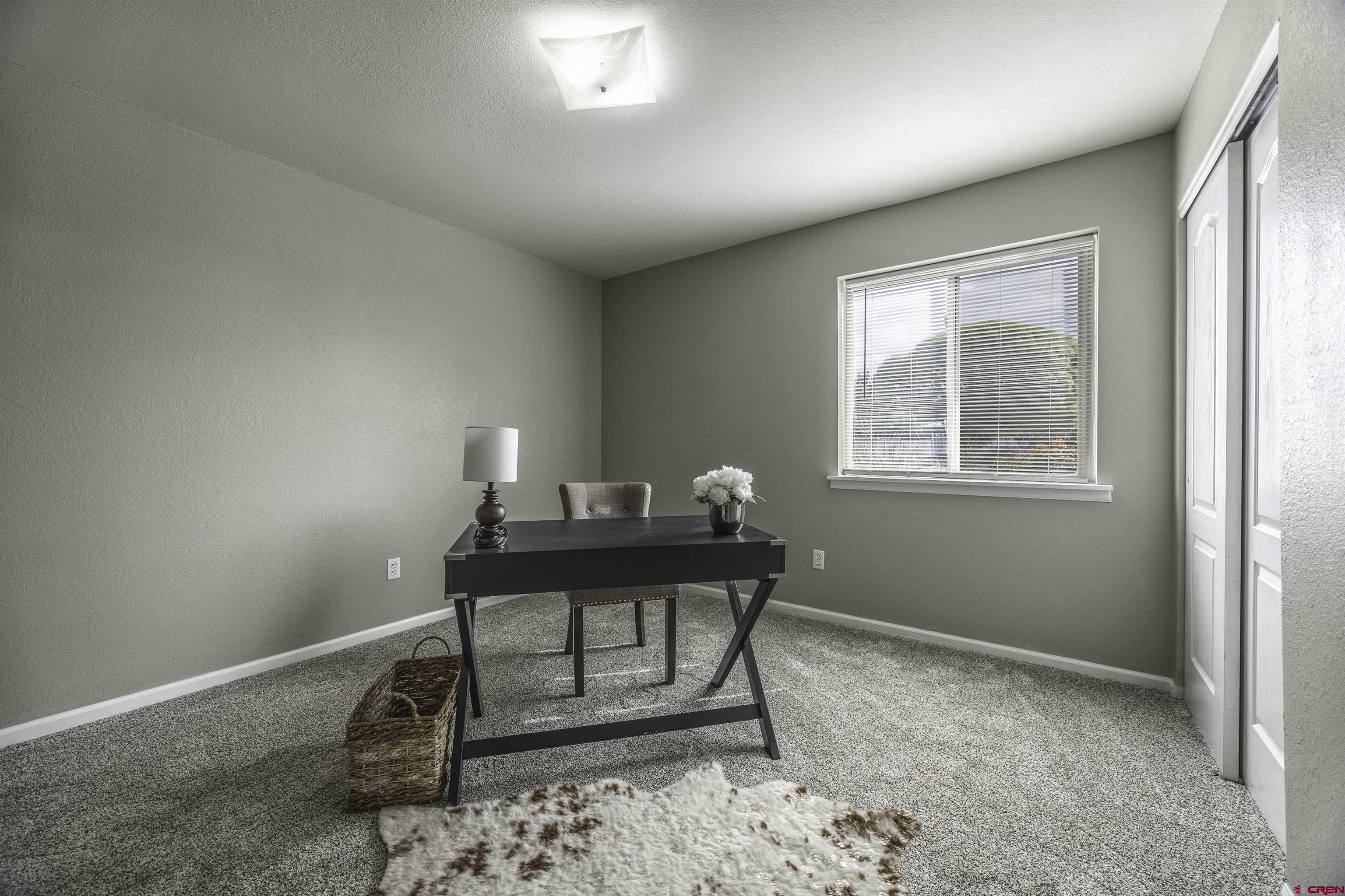16303 6420th Road Montrose, CO 81403 - Photo 14 of 31 a workspace with furniture and window