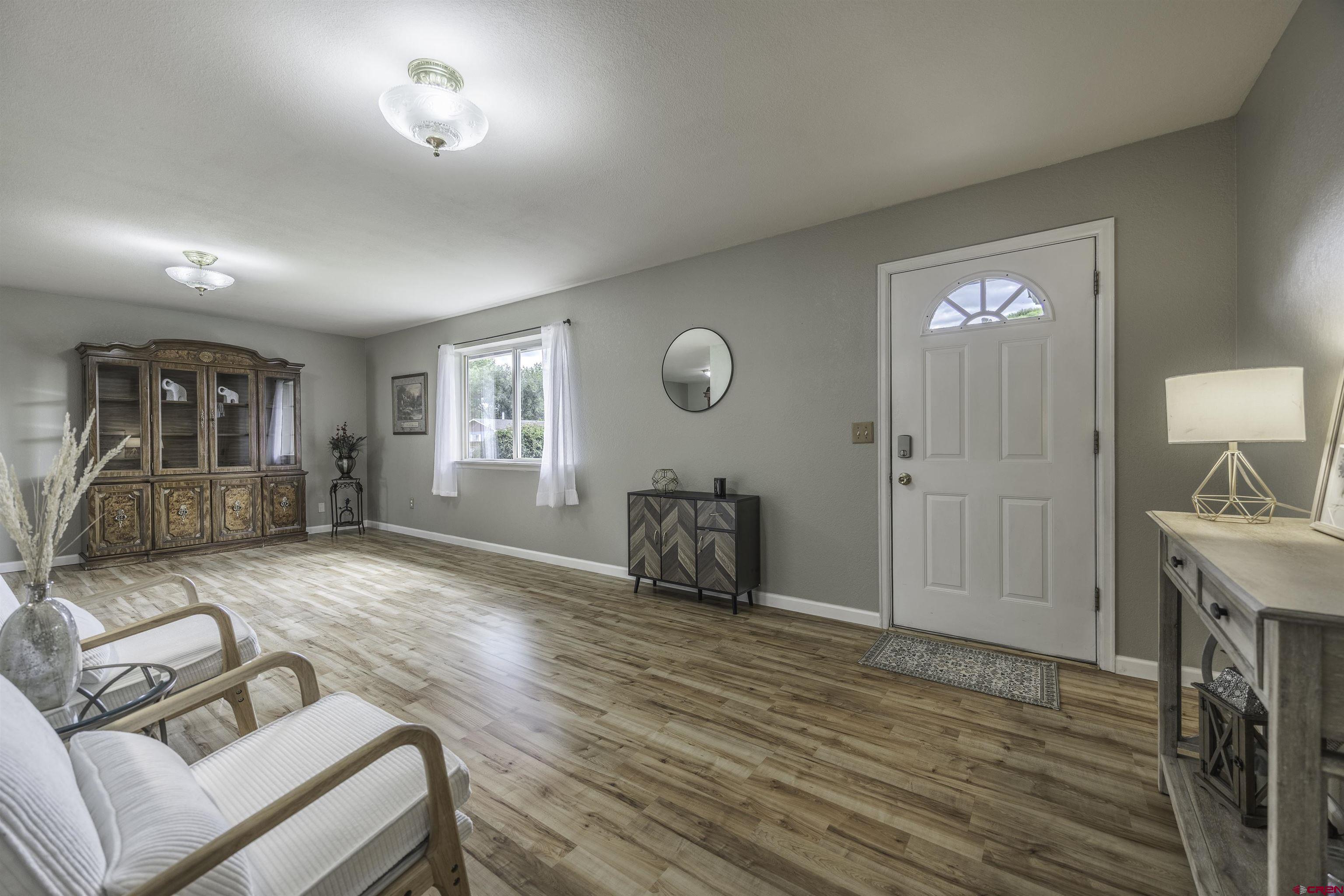 16303 6420th Road Montrose, CO 81403 - Photo 5 of 31 a living room with furniture