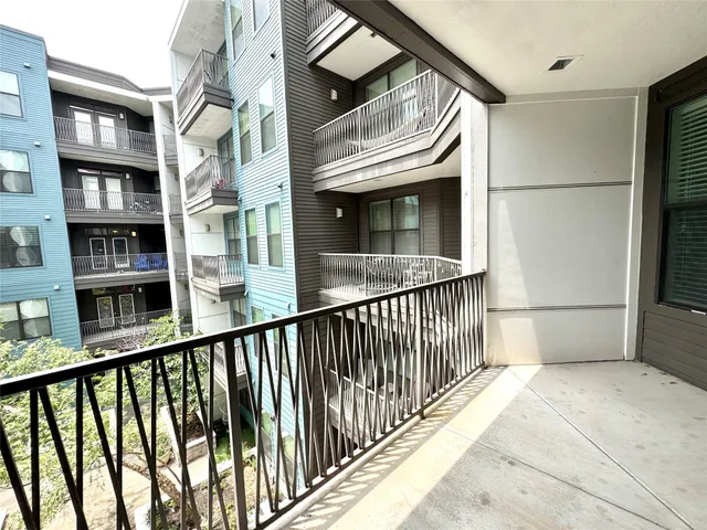a view of a building from a balcony